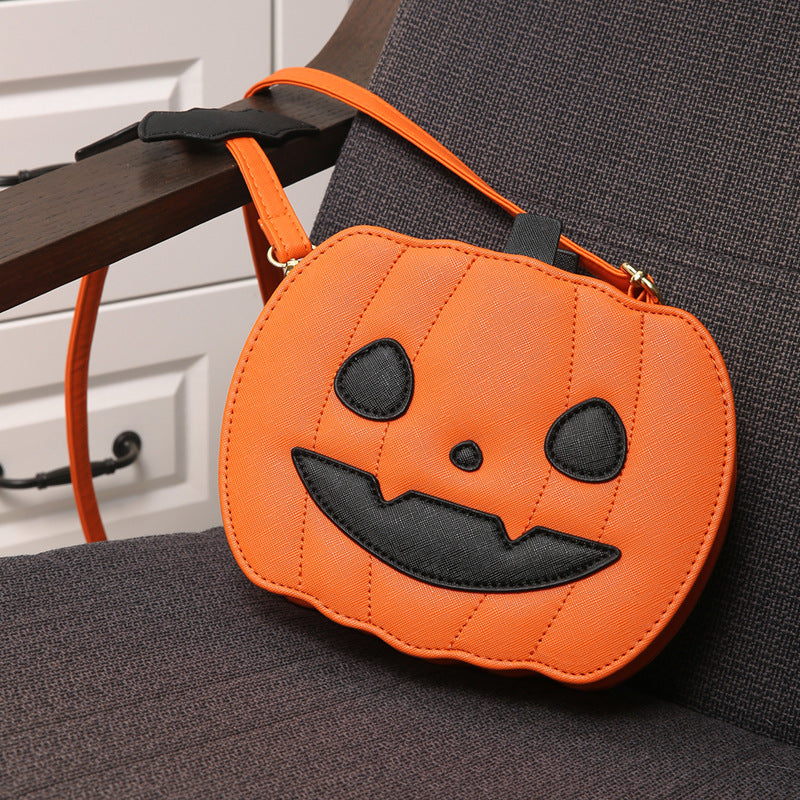 Handväska med pumpamotiv – crossbody i PU
