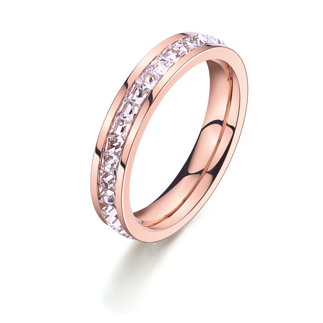 Roséguldfärgad ring i titanstål med rosett