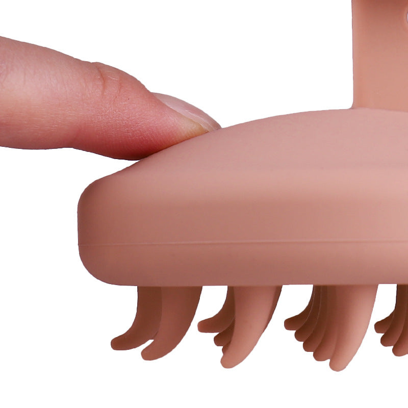 Skalpmassageborste – silikonpiggar i närbild