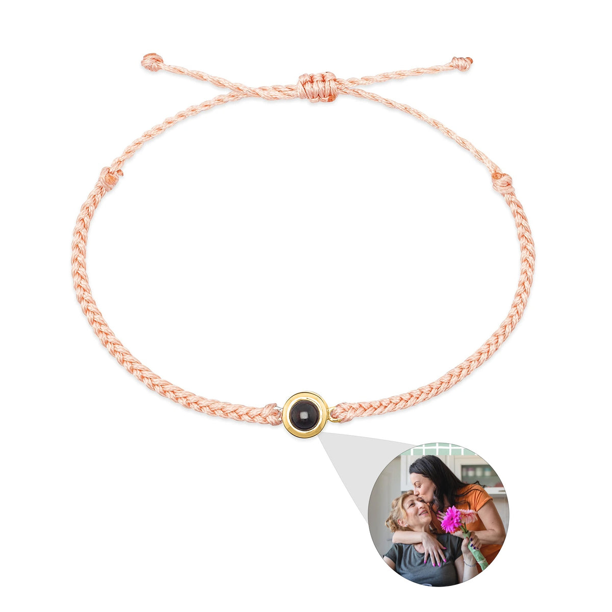 Fotoarmband med orange band och guldfärgad infattning