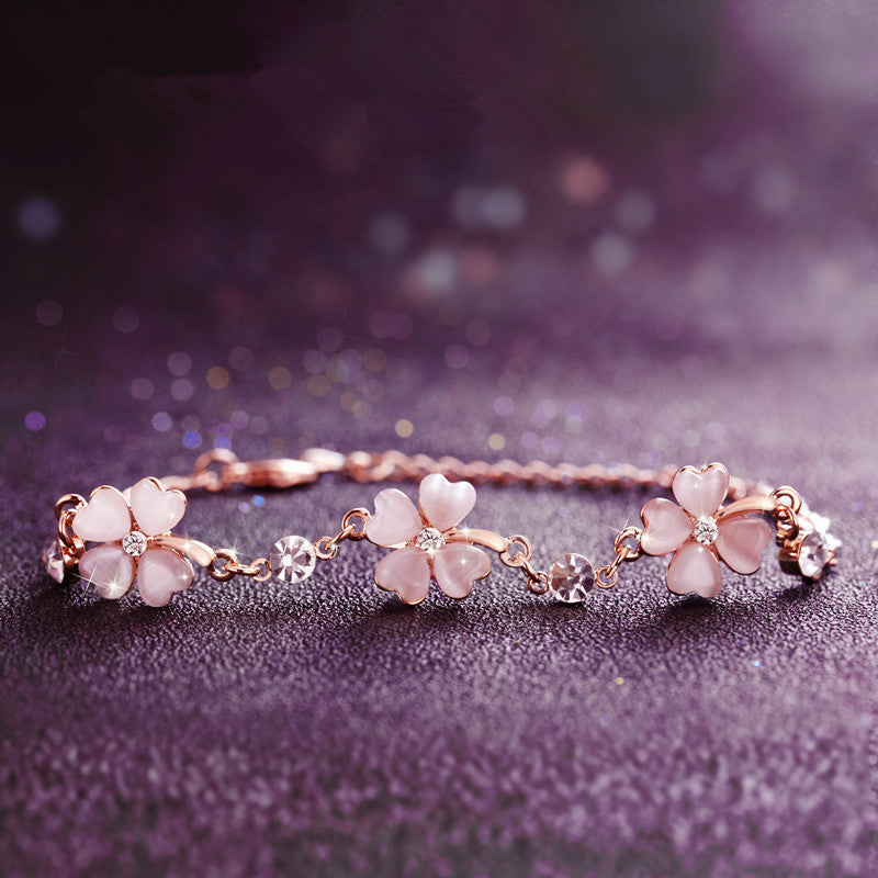 Armband med fyrklöver i roséguldfärgad koppar