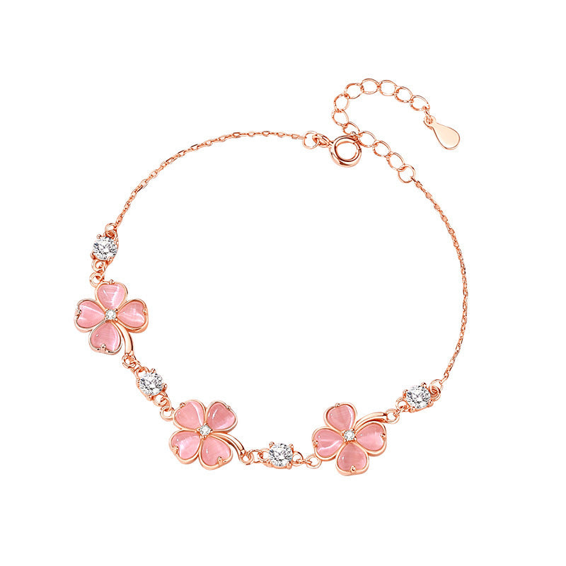 Armband med fyrklöver i roséguldfärgad koppar