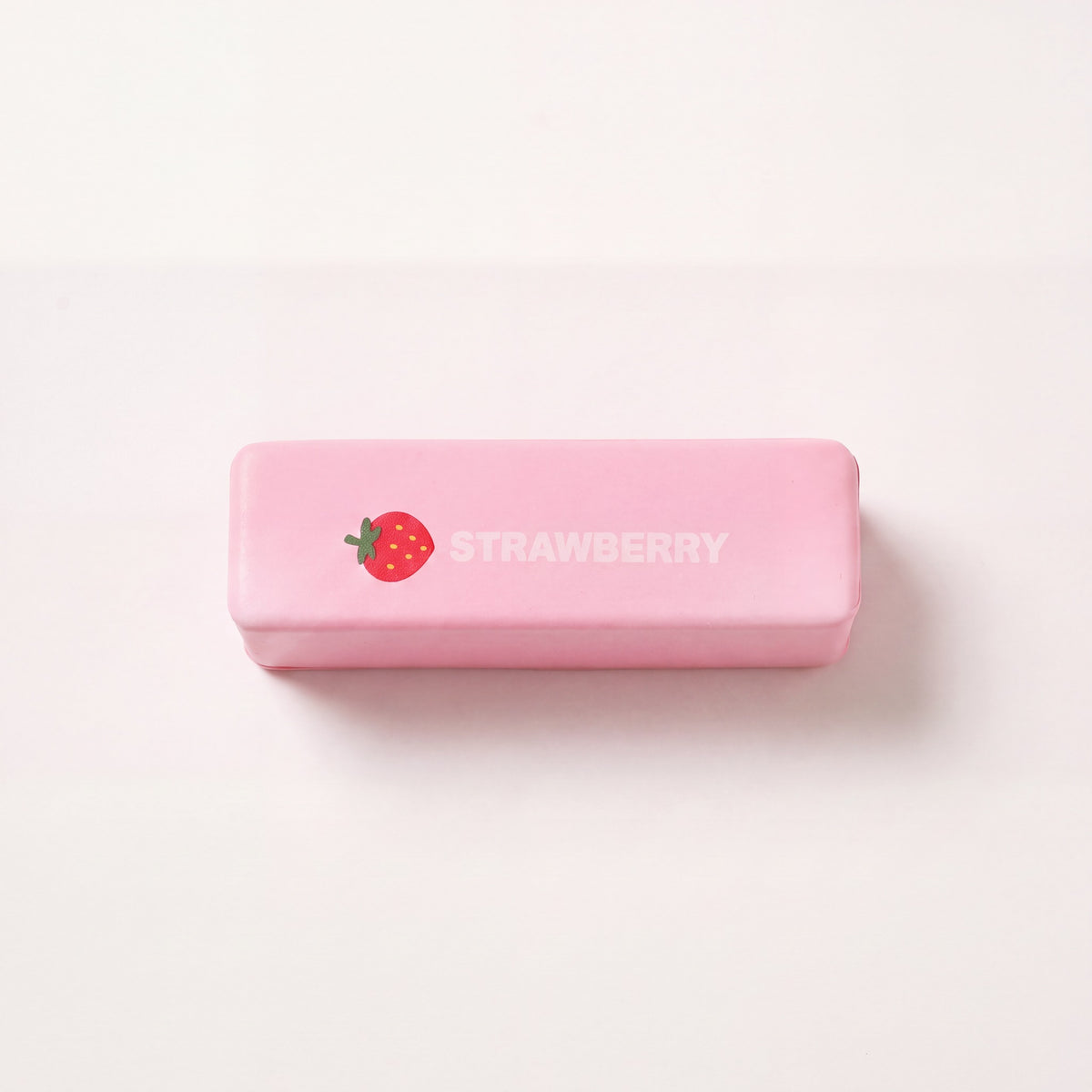 Stressleksak smorpaket rosa strawberry utan plastfilm pa neutral bakgrund