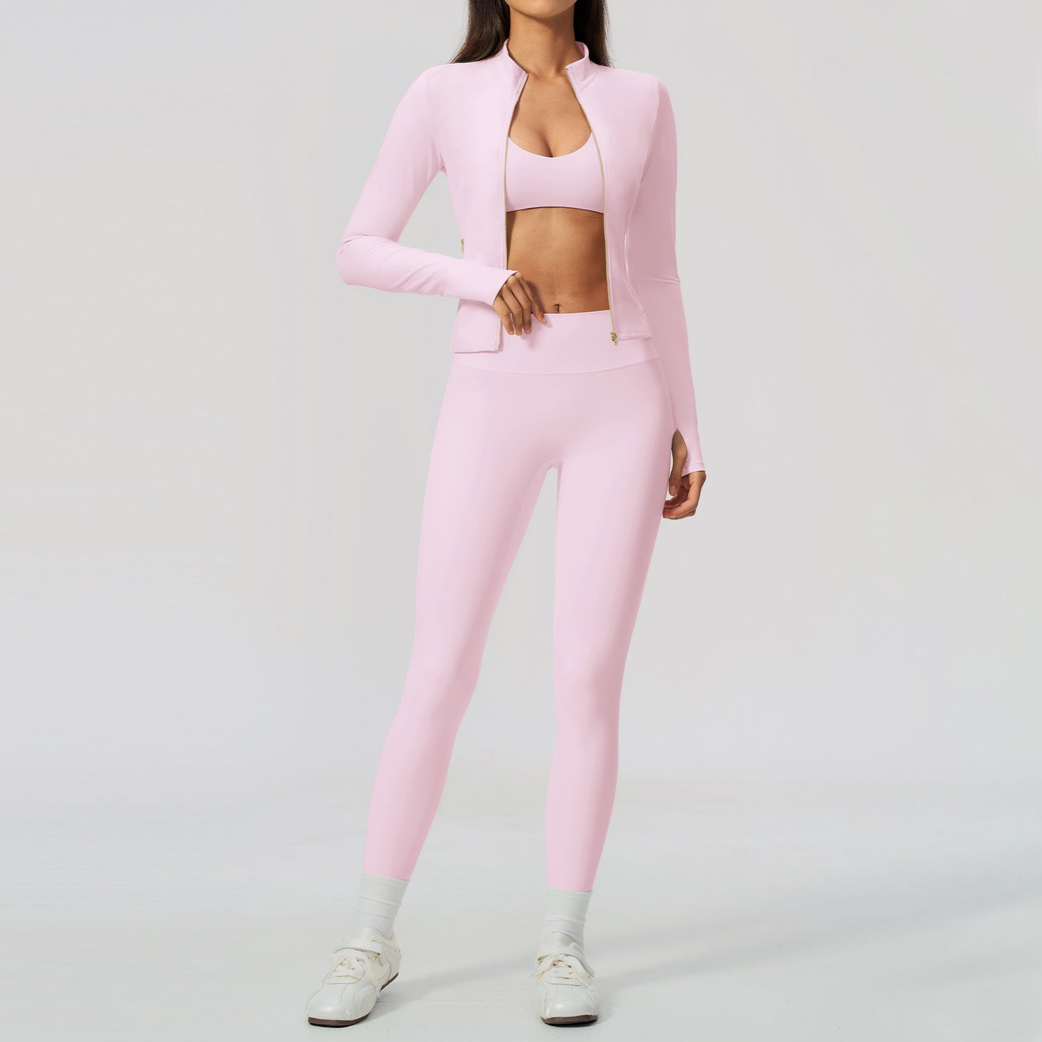 Körsbärsrosa yogaset med bh-topp, högmidjade tights och kort jacka med dragkedja