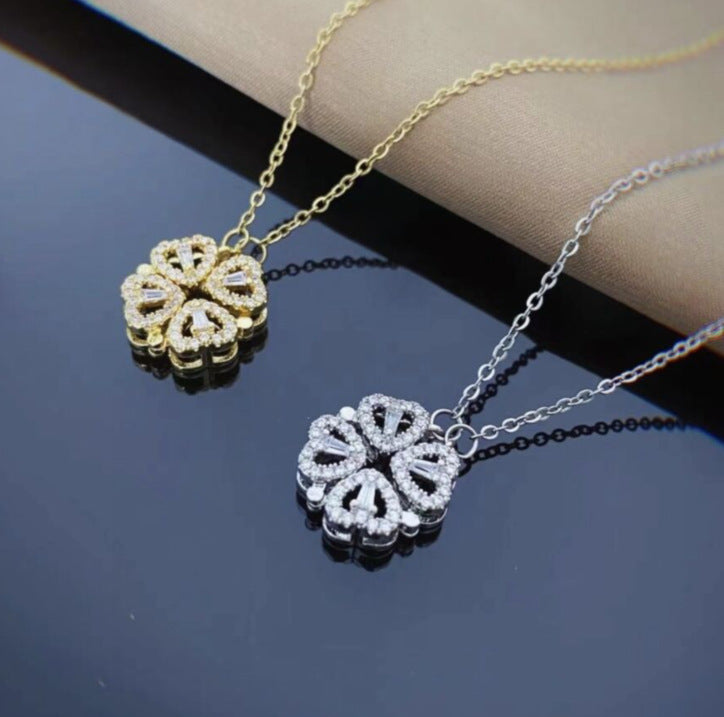 Magnetiskt halsband med hjärta och fyrklöver i silver